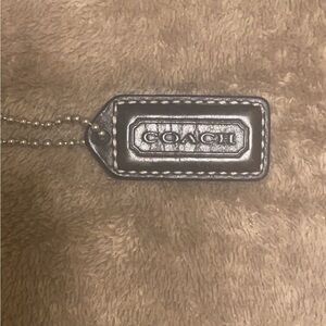 Small Coach Brown leather hangtag